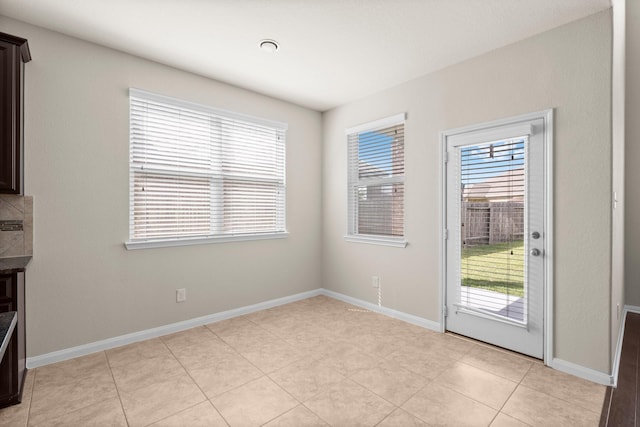 18115 Fernwood Bend Dr, Tomball, TX 77377 - unfurnished dining area with baseboards