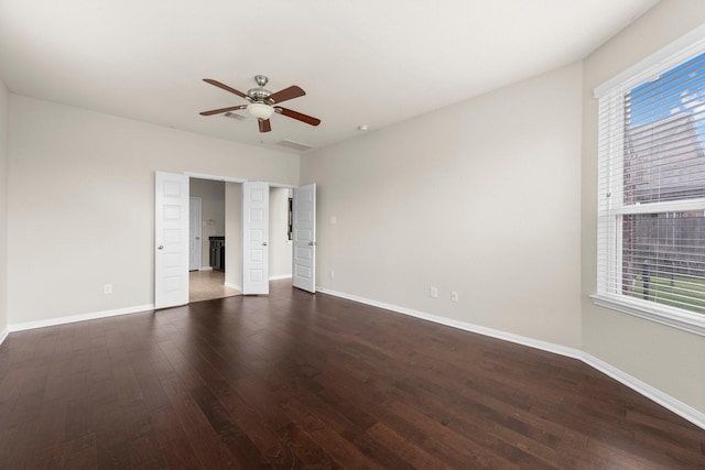 18115 Fernwood Bend Dr, Tomball, TX 77377 - spare room featuring wood-type flooring, a ceiling fan, and baseboards