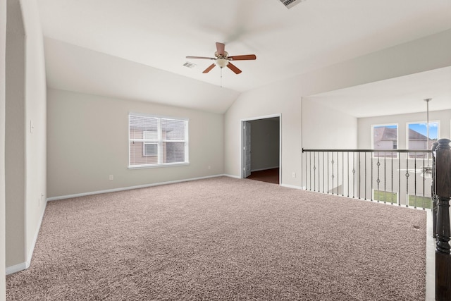 18115 Fernwood Bend Dr, Tomball, TX 77377 - unfurnished room featuring a ceiling fan, carpet flooring, lofted ceiling, and baseboards