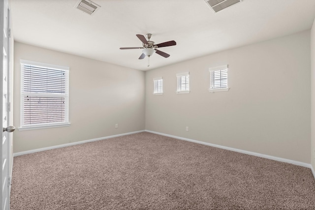 18115 Fernwood Bend Dr, Tomball, TX 77377 - empty room featuring carpet flooring, baseboards, and a ceiling fan