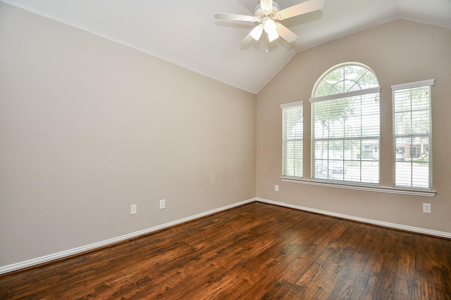 2627 Old River Ln, Richmond, TX 77406 - empty room featuring dark wood finished floors, vaulted ceiling, ceiling fan, and baseboards