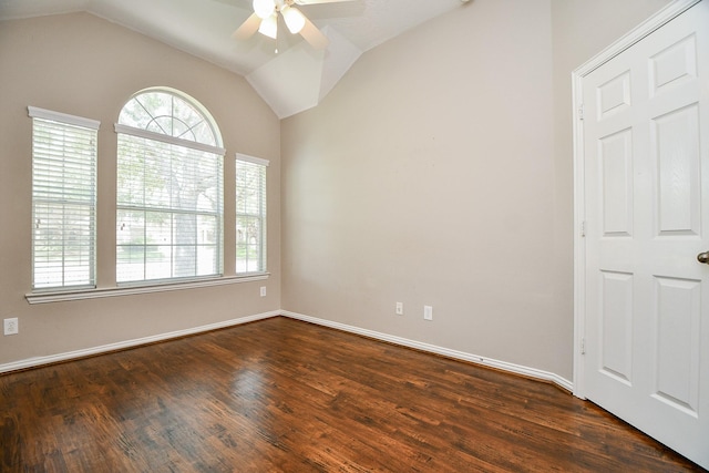 2627 Old River Ln, Richmond, TX 77406 - empty room with vaulted ceiling, ceiling fan, dark wood finished floors, and baseboards