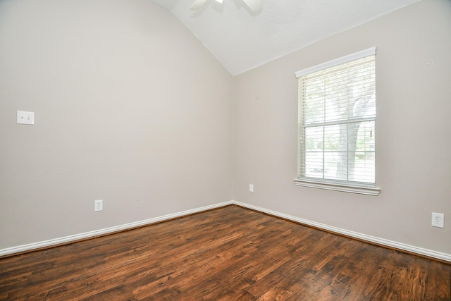 2627 Old River Ln, Richmond, TX 77406 - empty room with vaulted ceiling, dark wood finished floors, plenty of natural light, baseboards, and a ceiling fan