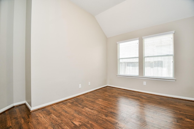 2627 Old River Ln, Richmond, TX 77406 - spare room with vaulted ceiling, dark wood finished floors, and baseboards