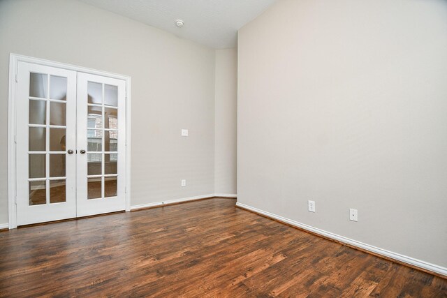 2627 Old River Ln, Richmond, TX 77406 - empty room with french doors, wood finished floors, and baseboards