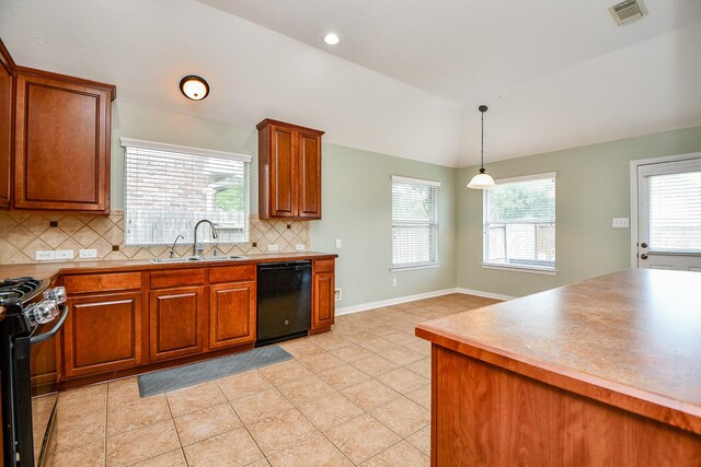 2627 Old River Ln, Richmond, TX 77406 - kitchen featuring black appliances, a sink, brown cabinets, lofted ceiling, and recessed lighting