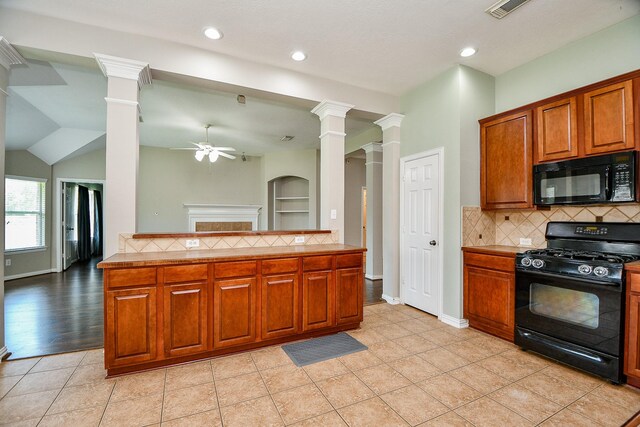 2627 Old River Ln, Richmond, TX 77406 - kitchen with black appliances, decorative columns, ceiling fan, backsplash, and recessed lighting
