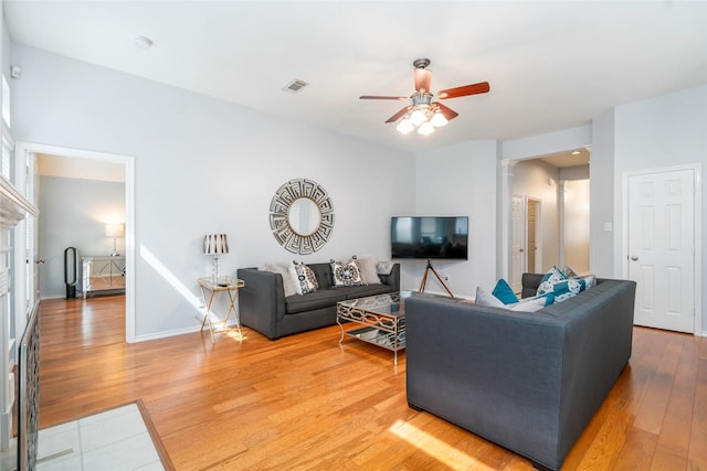 3510 Brookstone Ct, Pearland, TX 77584 - living room with a ceiling fan and light wood-type flooring