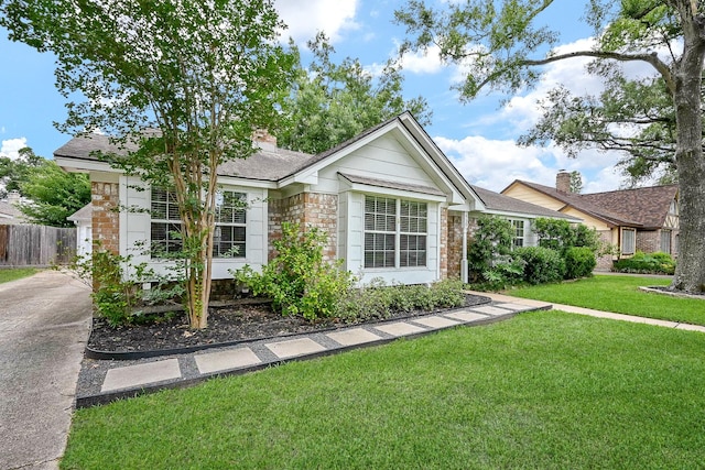 2730 Manila Ln, Houston, TX 77043 - ranch-style home featuring stone siding and a chimney