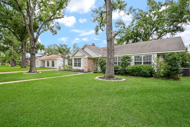 2730 Manila Ln, Houston, TX 77043 - ranch-style house featuring a front lawn, central AC, and a chimney