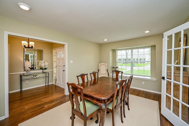 2730 Manila Ln, Houston, TX 77043 - dining space featuring a chandelier, dark wood finished floors, recessed lighting, and baseboards