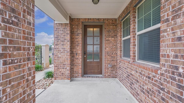 9423 Towne Lake Pkwy, Cypress, TX 77433 - property entrance featuring brick siding