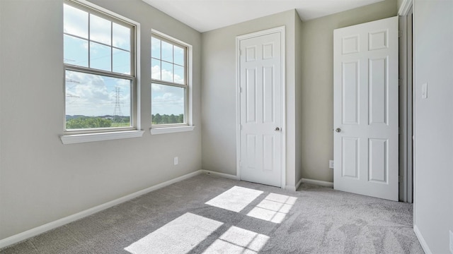 9423 Towne Lake Pkwy, Cypress, TX 77433 - unfurnished bedroom featuring carpet flooring and a closet