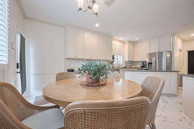 1942 Crisfield Dr, Sugar Land, TX 77479 - dining area featuring a chandelier, ornamental molding, light marble finish flooring, and recessed lighting