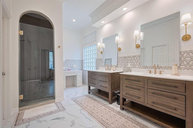 1942 Crisfield Dr, Sugar Land, TX 77479 - full bathroom featuring marble finish flooring, two vanities, a tub, a stall shower, and recessed lighting
