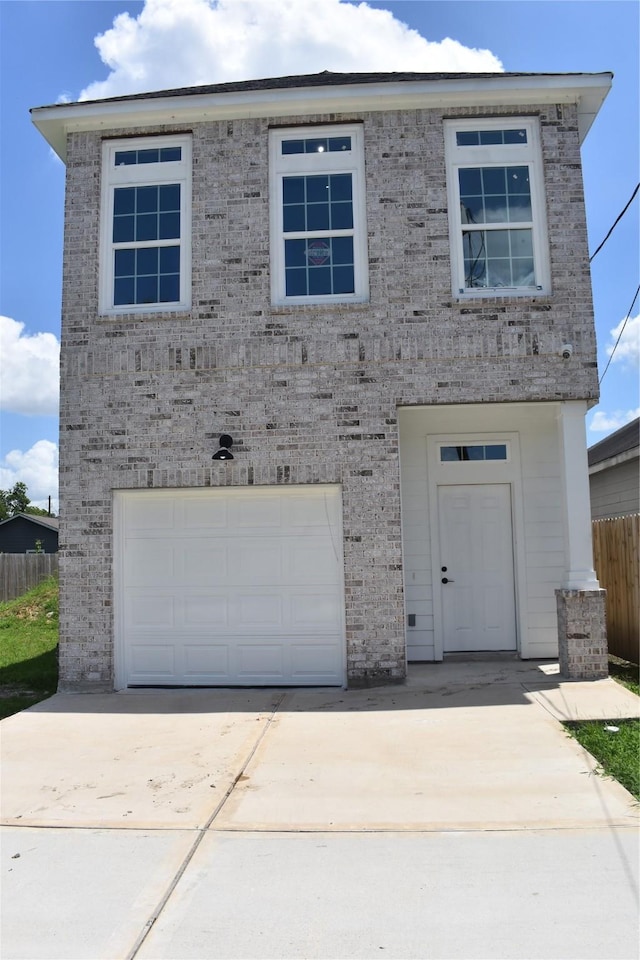 4116 Alvin St, Houston, TX 77051 - view of front of property featuring an attached garage, concrete driveway, and brick siding