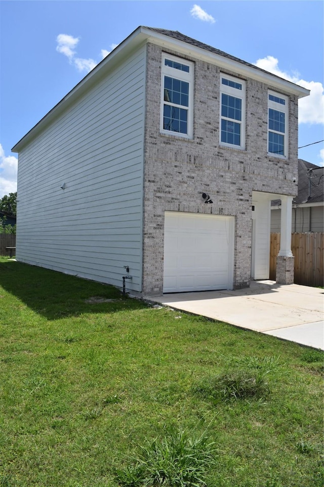 4116 Alvin St, Houston, TX 77051 - view of home's exterior with an attached garage, concrete driveway, and brick siding