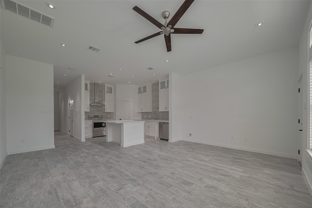 4116 Alvin St, Houston, TX 77051 - unfurnished living room featuring ceiling fan, recessed lighting, and light wood finished floors