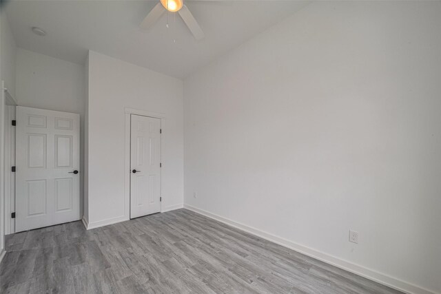 4116 Alvin St, Houston, TX 77051 - unfurnished bedroom with wood finished floors and ceiling fan
