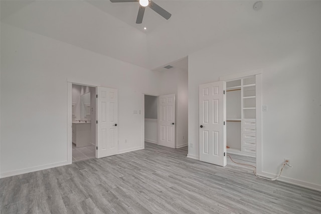 4116 Alvin St, Houston, TX 77051 - unfurnished bedroom featuring a high ceiling, wood finished floors, ensuite bath, a spacious closet, and ceiling fan