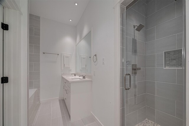 4116 Alvin St, Houston, TX 77051 - full bath featuring a shower stall, vanity, tile patterned flooring, and recessed lighting