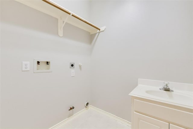 3402 Pebble Beach Ln, Pearland, TX 77584 - laundry area with hookup for a gas dryer, washer hookup, electric dryer hookup, and baseboards