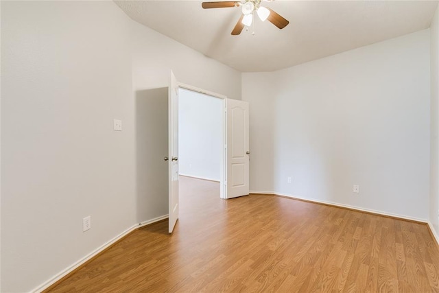 3402 Pebble Beach Ln, Pearland, TX 77584 - unfurnished room featuring a ceiling fan, light wood-type flooring, and baseboards