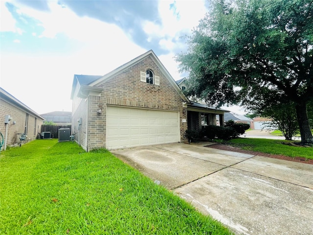20702 Dappled Ridge Way, Humble, TX 77338 - view of front facade featuring brick siding, concrete driveway, central AC, and a front lawn