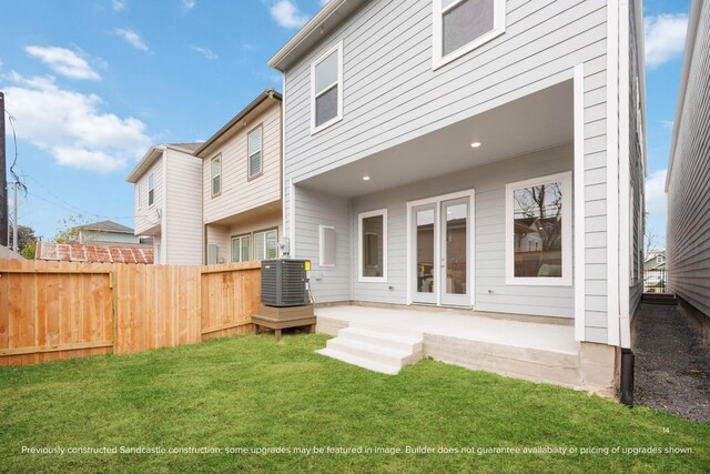 833 Fisher St Unit E, Houston, TX 77018 - rear view of property with central air condition unit and a patio