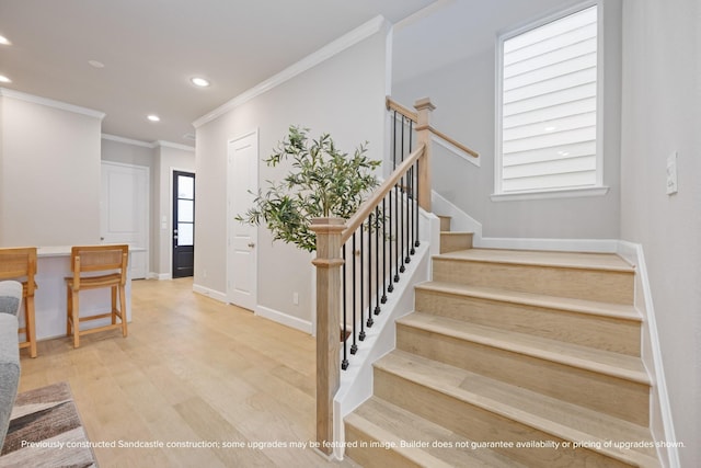 833 Fisher St Unit E, Houston, TX 77018 - entryway with crown molding, recessed lighting, stairway, wood finished floors, and baseboards