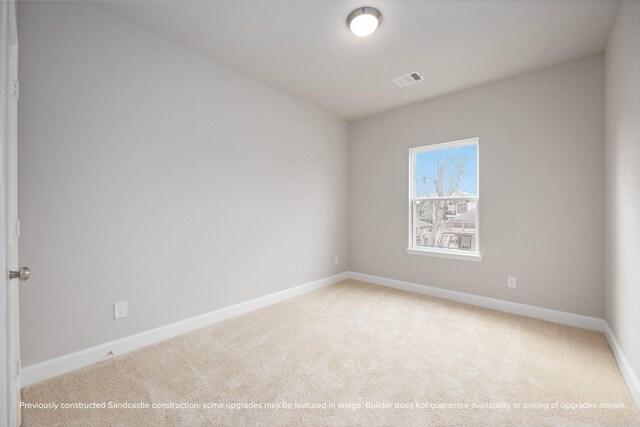 833 Fisher St Unit E, Houston, TX 77018 - empty room featuring carpet and baseboards