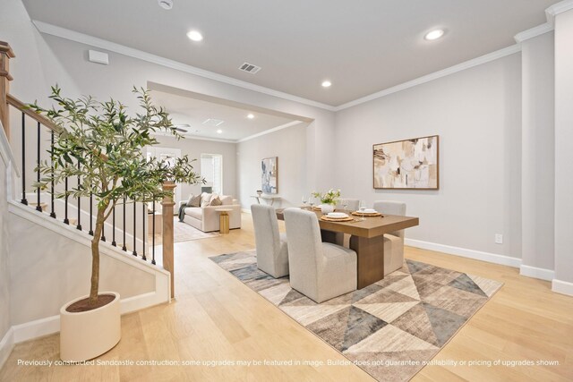 833 Fisher St Unit E, Houston, TX 77018 - dining area featuring stairs, wood finished floors, baseboards, recessed lighting, and crown molding
