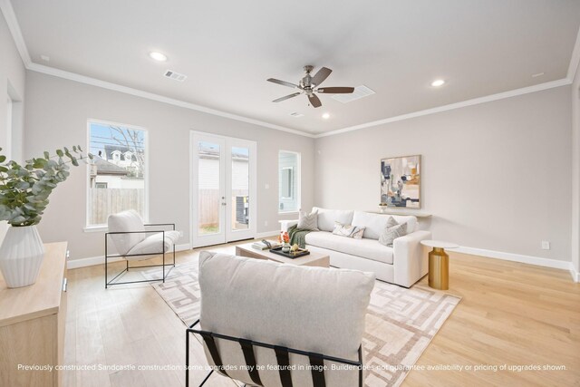 833 Fisher St Unit E, Houston, TX 77018 - living room with ceiling fan, light wood-type flooring, ornamental molding, baseboards, and recessed lighting