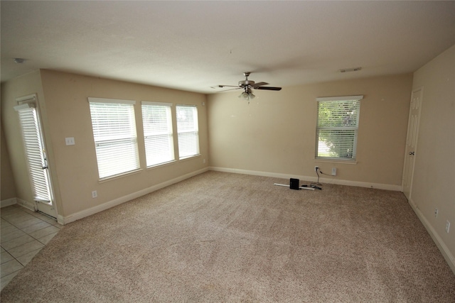 16218 Bresslyn, Cypress, TX 77429 - empty room with healthy amount of natural light, ceiling fan, and baseboards