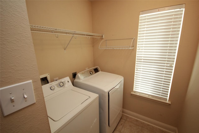16218 Bresslyn, Cypress, TX 77429 - laundry room with washer and dryer, tile patterned flooring, and baseboards