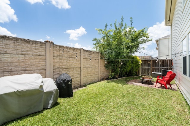 1765 Aden Dr, Houston, TX 77003 - fenced backyard with a fire pit
