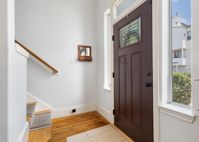 1765 Aden Dr, Houston, TX 77003 - entrance foyer featuring stairway, plenty of natural light, and wood finished floors