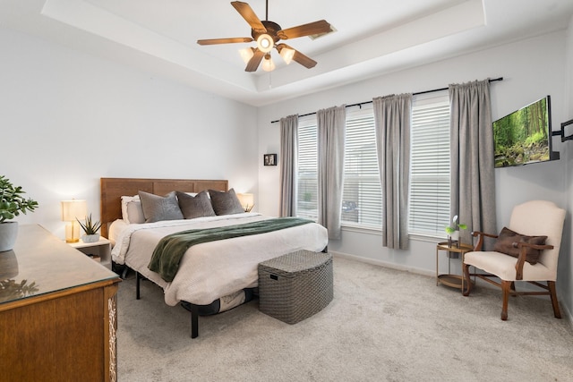 1765 Aden Dr, Houston, TX 77003 - bedroom with a raised ceiling, light carpet, and ceiling fan