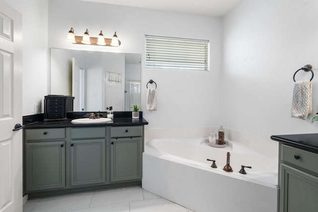 1765 Aden Dr, Houston, TX 77003 - bathroom featuring vanity, a garden tub, tile patterned floors, and a shower with door