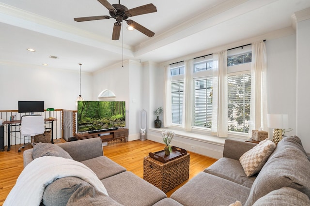 1765 Aden Dr, Houston, TX 77003 - living area featuring crown molding, ceiling fan, light wood-type flooring, recessed lighting, and a raised ceiling