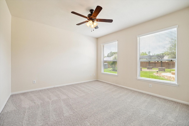 22611 Pineleigh Ct, Tomball, TX 77375 - carpeted spare room featuring baseboards and a ceiling fan