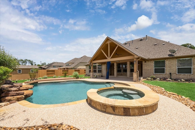 22611 Pineleigh Ct, Tomball, TX 77375 - view of pool featuring a patio, ceiling fan, and a pool with connected hot tub