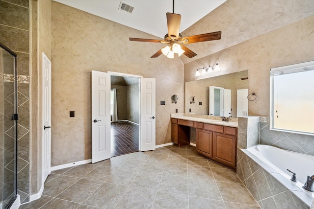 22611 Pineleigh Ct, Tomball, TX 77375 - full bathroom featuring vanity, a garden tub, a stall shower, and ceiling fan