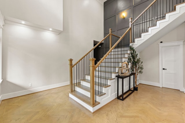 6001 Norhill Blvd, Houston, TX 77009 - staircase with a high ceiling, baseboards, and recessed lighting