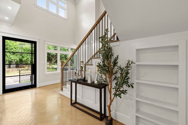 6001 Norhill Blvd, Houston, TX 77009 - foyer entrance with a high ceiling, stairs, baseboards, and recessed lighting