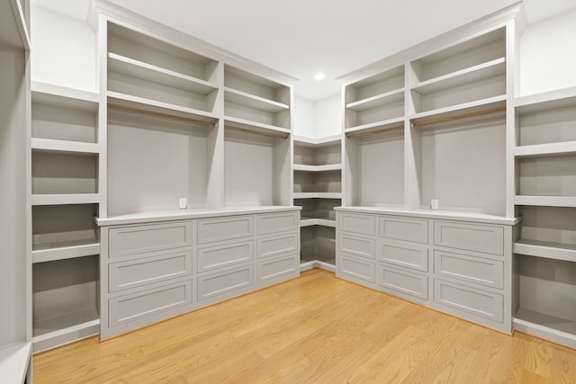 6001 Norhill Blvd, Houston, TX 77009 - walk in closet featuring light wood-type flooring