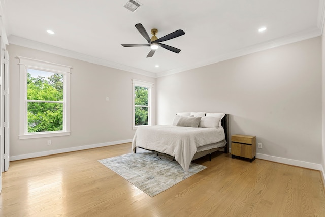 6001 Norhill Blvd, Houston, TX 77009 - bedroom featuring baseboards, light wood-style flooring, crown molding, recessed lighting, and ceiling fan