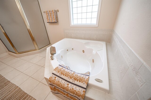 918 Dogwood Ridge Dr, Diboll, TX 75941 - full bath with a shower stall, a whirlpool tub, and tile patterned floors