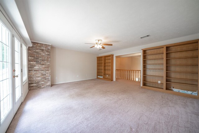 918 Dogwood Ridge Dr, Diboll, TX 75941 - spare room featuring ceiling fan and carpet floors