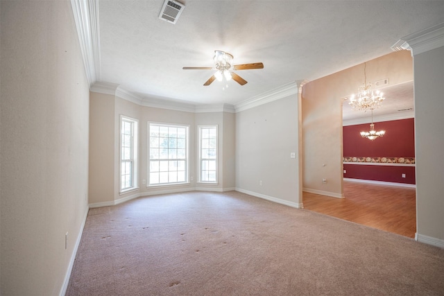 918 Dogwood Ridge Dr, Diboll, TX 75941 - carpeted empty room with ornamental molding, a chandelier, a ceiling fan, and baseboards